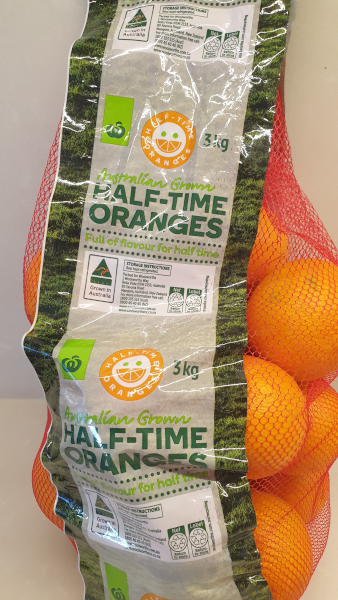 Bag of oranges labelled half-time oranges